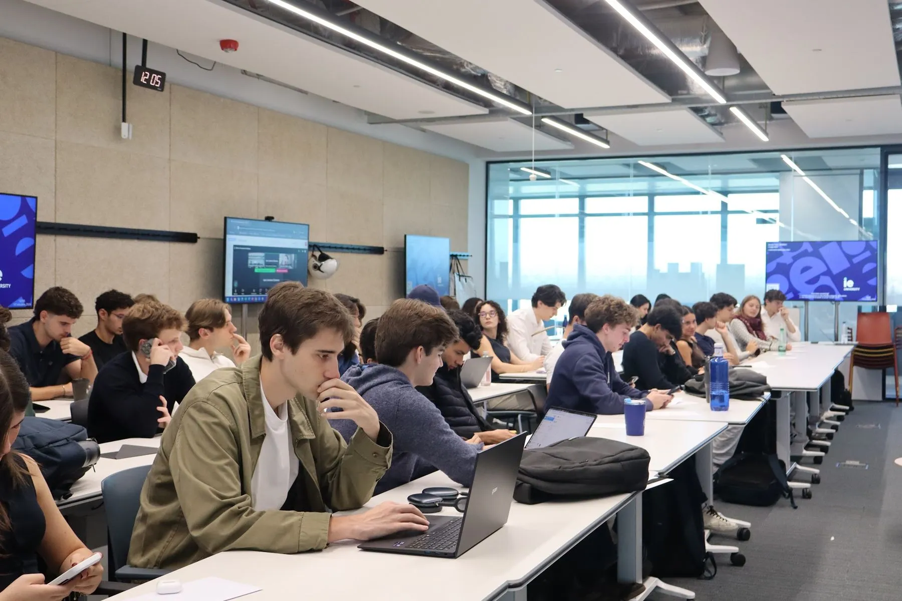 A student analysing companies on ATLAS during the kickoff